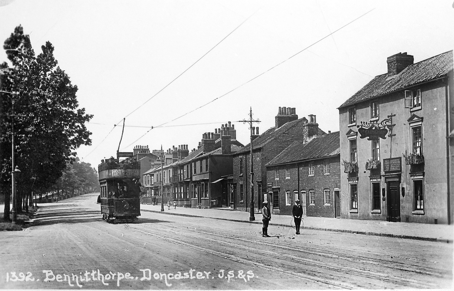A tram on Bennetthorpe passes the original Rockingham Inn, early 1900s